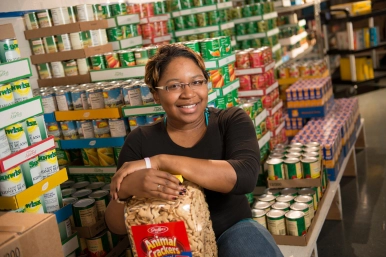 student sitting in food pantry