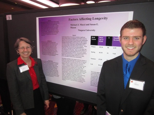 Student presenting research on longevity