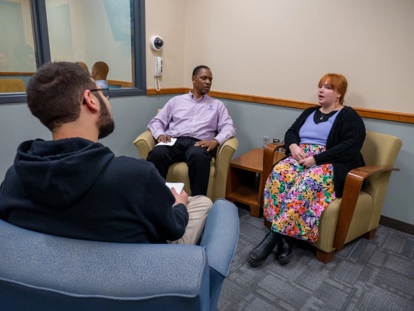 Students in clinical counseling session
