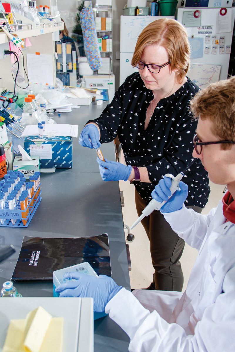 professor and student working in lab