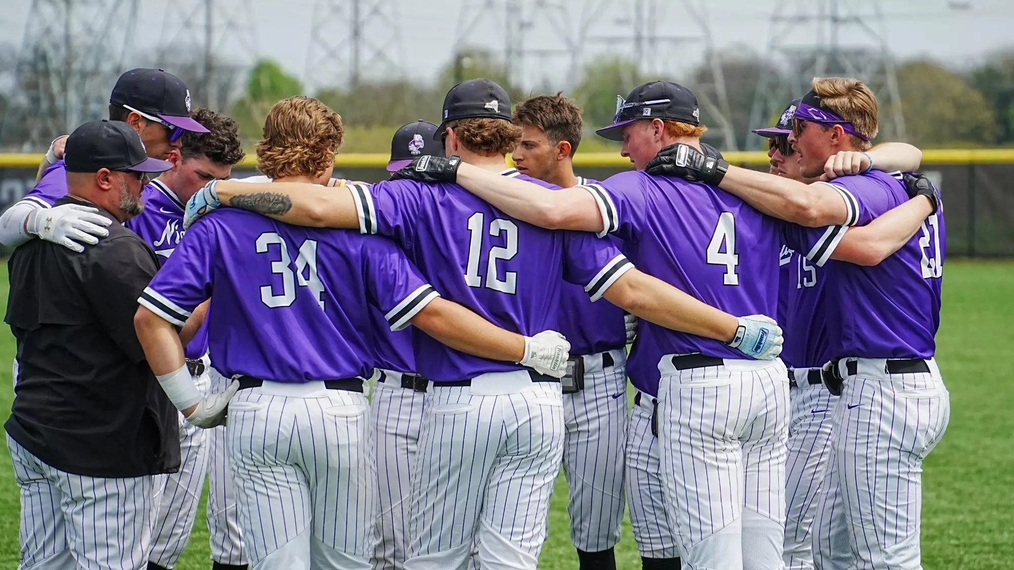 Baseball team huddle