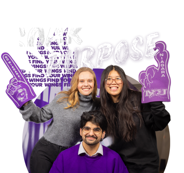 Three students smiling with two different foam fingers with the NU logo on them.