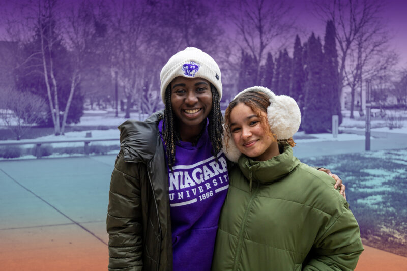 Smiling Niagara University Students at Open House