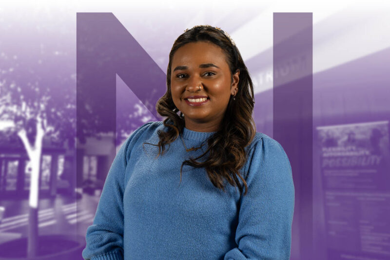 Smiling NU student at Grad Spring Open House