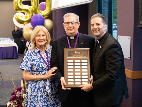 Father Maher with award