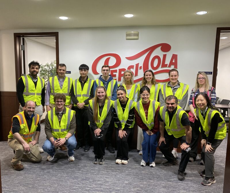 Student and teachers at Pepsi-Cola